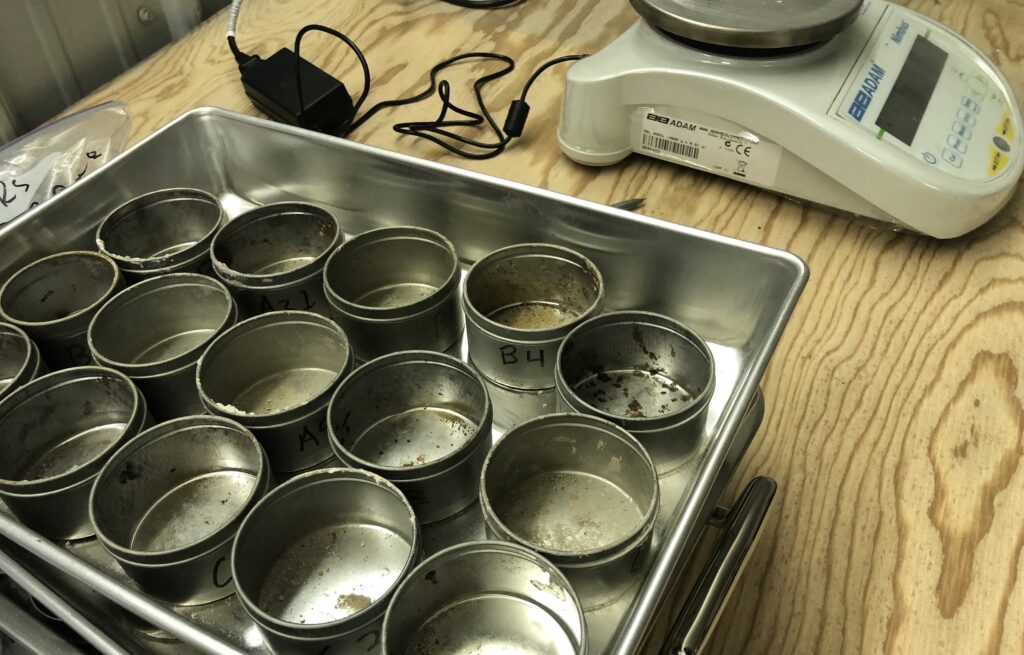 Different labeled soil samples being tested in the JB Engineers laboratory